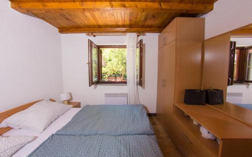 Postel nebo postele na pokoji v ubytování Vacation Home Hercegovka