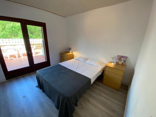Postel nebo postele na pokoji v ubytování Rec Dalt - Mas Pinell