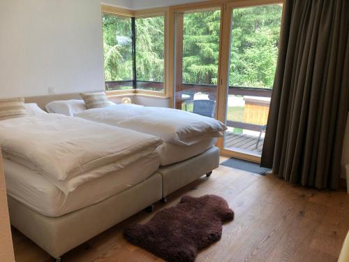 Ένα ή περισσότερα κρεβάτια σε δωμάτιο στο Haus Galileo