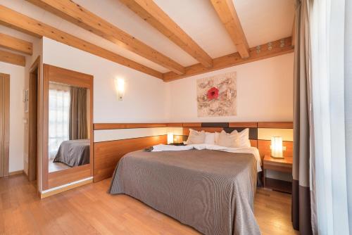 Postel nebo postele na pokoji v ubytování Green Village Eco Resort
