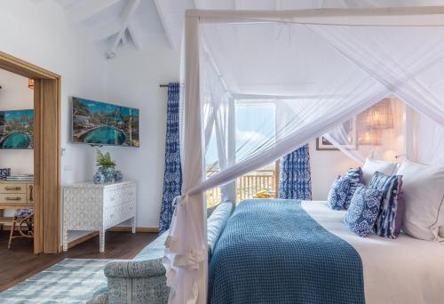 Кровать или кровати в номере GYP SEA Saint Barth
