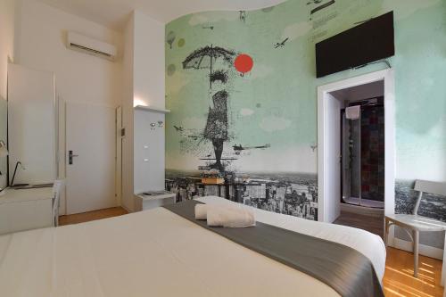 Een bed of bedden in een kamer bij Suites Farnese Design