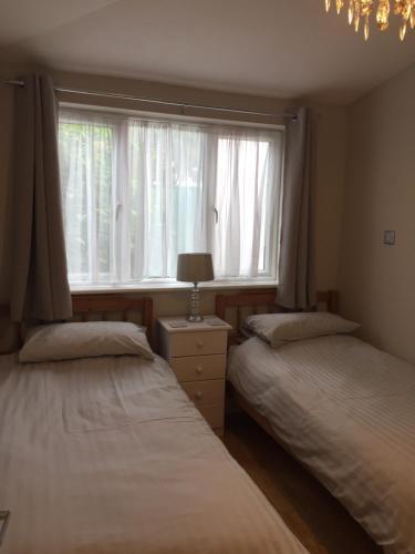 A bed or beds in a room at The City Annexe 