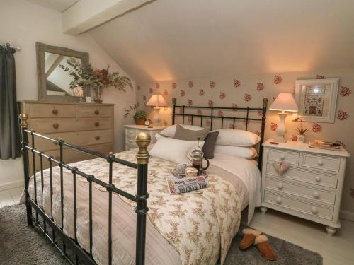 Postelja oz. postelje v sobi nastanitve Grange Cottage