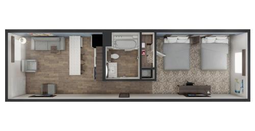- un plan d'étage d'un petit appartement avec une chambre dans l'établissement stayAPT Suites Goldsboro-Seymour Johnson AFB, à Goldsboro