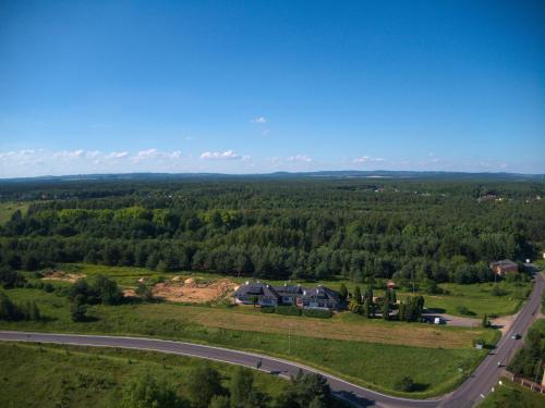 an aerial view of a house and a road at Zajazd Maj in Bolesław