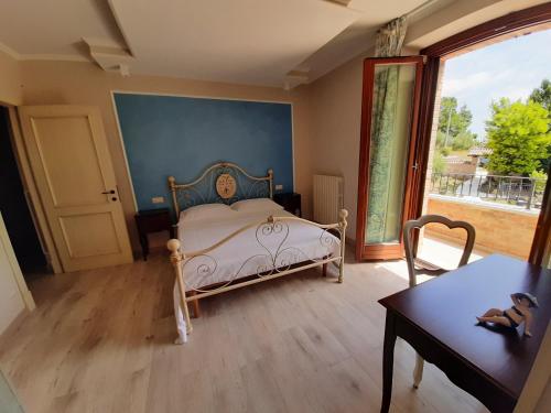 A bed or beds in a room at Casa Sofia