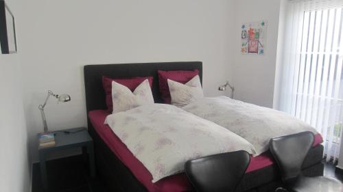 En eller flere senge i et værelse på Bed & Breakfast Ribe