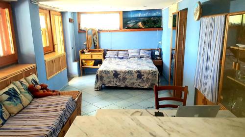 Двухъярусная кровать или двухъярусные кровати в номере Villa Calamona
