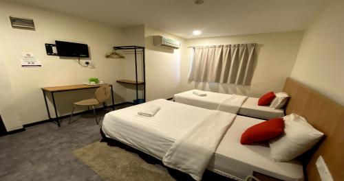 En eller flere senger på et rom på D'Garden Hotel Kuala Lumpur