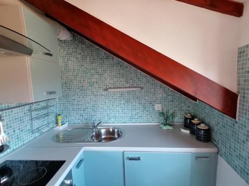 a kitchen with a sink and a counter top at Villa Sv. Petar in Trogir