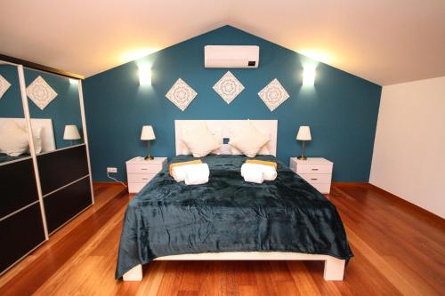 Ένα ή περισσότερα κρεβάτια σε δωμάτιο στο LUXURY APARTMENT - T1 vue sur piscine - PRAIA DA LUZ