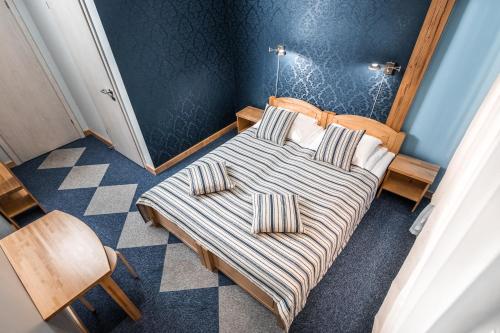 Llit o llits en una habitació de Abzali Hotel and Restaurant with self check-in