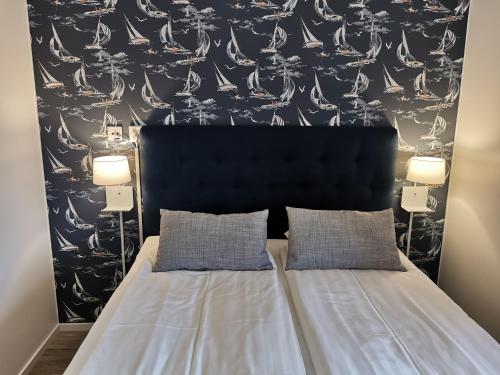 Ένα ή περισσότερα κρεβάτια σε δωμάτιο στο Kils Hotell & Restaurang