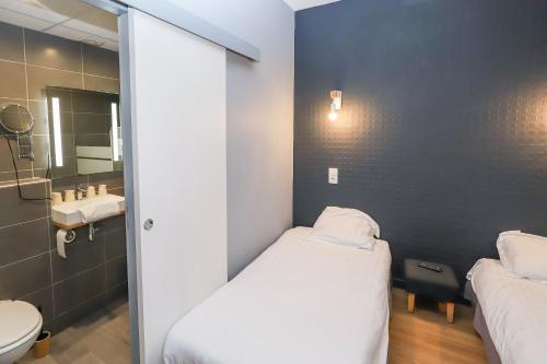 Ένα μπάνιο στο Hôtel La Réserve de Brive