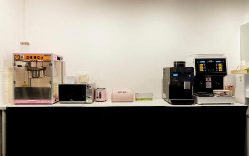 a group of appliances sitting on top of a counter at Incheon Airtel in Incheon