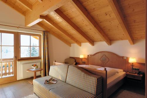Ένα ή περισσότερα κρεβάτια σε δωμάτιο στο Apartments Hubertushof