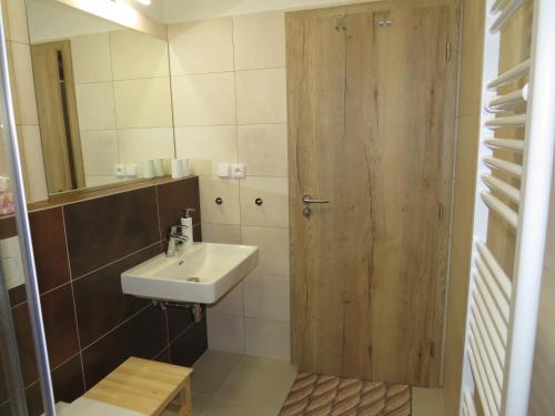 Koupelna v ubytování Apartman Honey