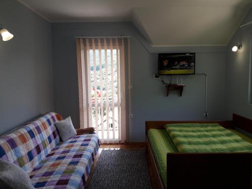 Krevet ili kreveti u jedinici u okviru objekta Apartmani Maksimović