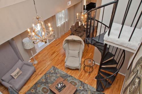 an overhead view of a living room with a chandelier at Onyx Hotels in Austin