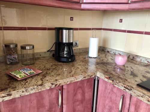 a coffee maker on a counter in a kitchen at Casa Alejandro II in Tarajalejo