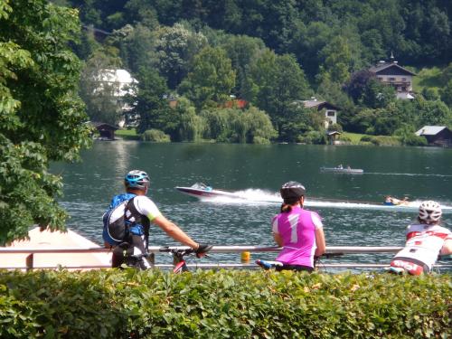 a group of people on a boat on a lake at Seehotel Sissi in Zell am See