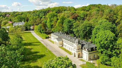 an aerial view of a building in the middle of a forest at Stare Łazienki in Nałęczów