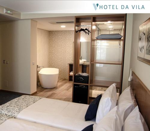 Ванна кімната в Hotel da Vila