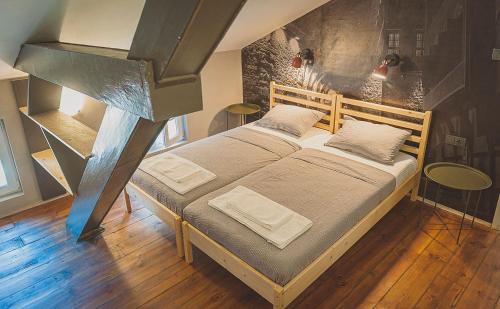 a bedroom with a large bed in a room at Temple House in Plovdiv