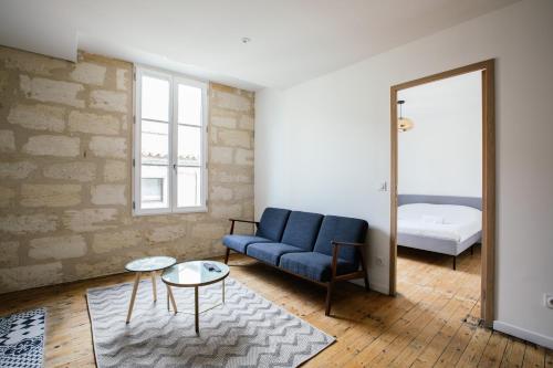 Afbeelding uit fotogalerij van Appartement spacieux et lumineux avec climatisation Halle 1ER in Castillon-la-Bataille