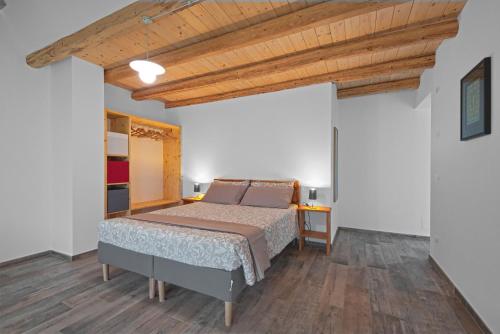 Ein Bett oder Betten in einem Zimmer der Unterkunft lioelara