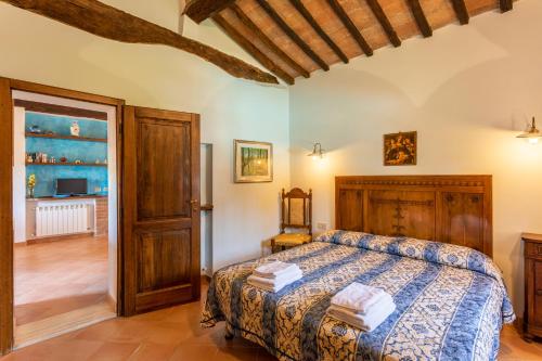 Ένα ή περισσότερα κρεβάτια σε δωμάτιο στο Agriturismo Vergelle