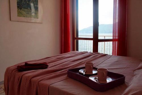 Säng eller sängar i ett rum på Casa Spiaggia