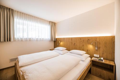 Cama o camas de una habitación en Appartements Sporting
