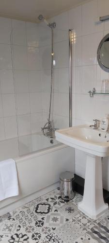 Et badeværelse på The Florence Guest House