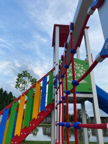 a colorful play structure at a playground at Green Village - Sirenetta in Savigliano
