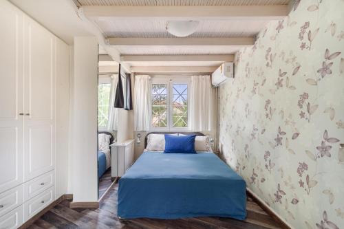 Кровать или кровати в номере Villa Maya