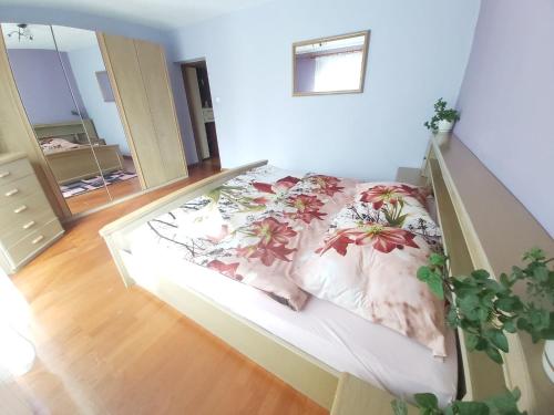 מיטה או מיטות בחדר ב-Apartament Berezka 667-108-706