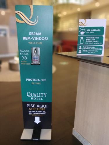 a sign for a product on a counter in a store at Quality Hotel Blumenau in Blumenau