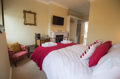 Кровать или кровати в номере The Portland Guesthouse
