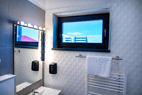 O baie la Enjoy Life Apartments