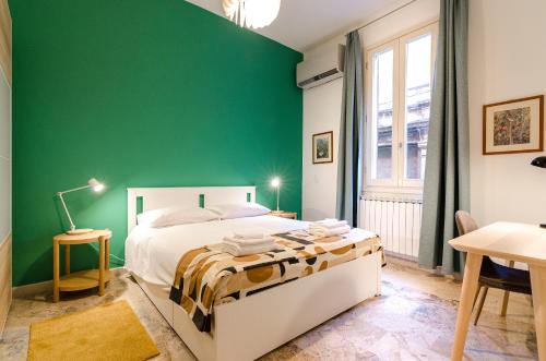 Cama ou camas em um quarto em Gessi Apartment