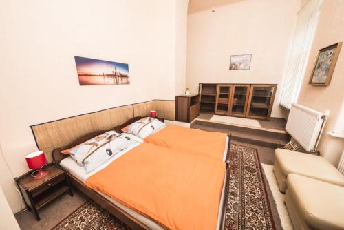 Posteľ alebo postele v izbe v ubytovaní Apartment DeLUXE