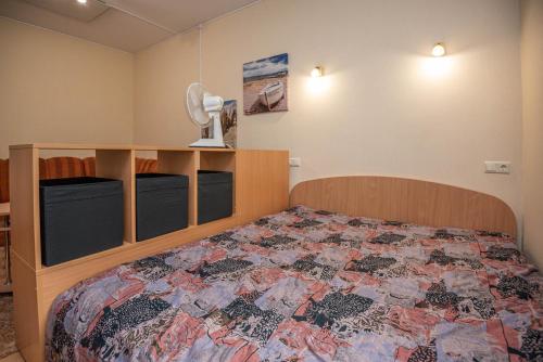 Llit o llits en una habitació de Centro Apartment