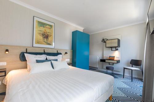 Een bed of bedden in een kamer bij HOTEL LEHOUCK