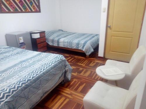 Cama o camas de una habitación en Peruvian Family Hostal Miraflores