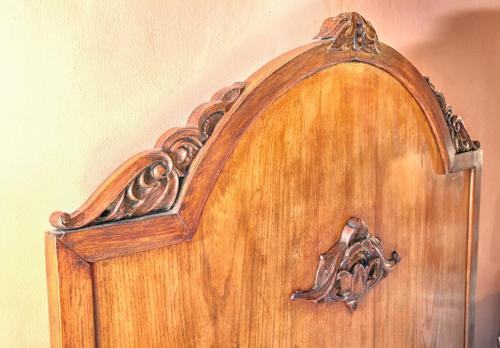 a wooden door with a carving on it at Guest House Old Plovdiv in Plovdiv