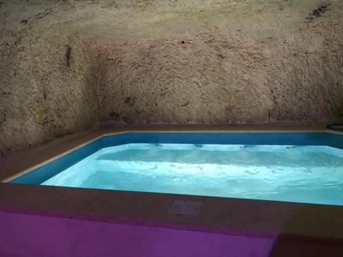 The swimming pool at or near Designer Finished Maisonette with Pool