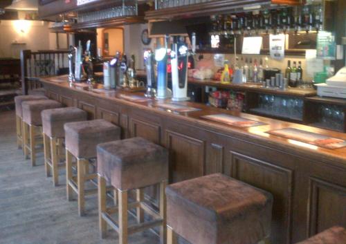 The lounge or bar area at The Friar Tucks 