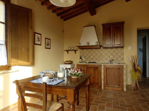 Kuchyň nebo kuchyňský kout v ubytování Agriturismo Poggio Tobruk